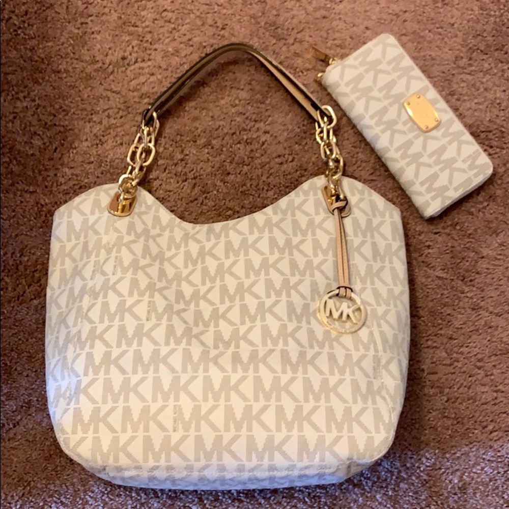 Micheal Kors monogram cream purse and wallet